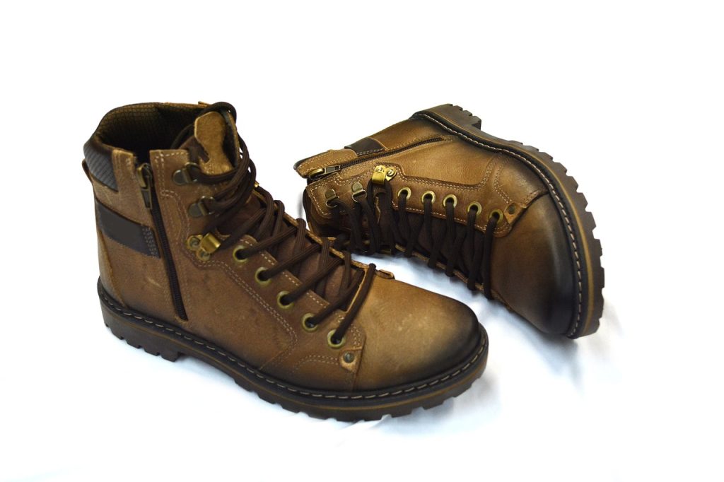 a pair of tan boots