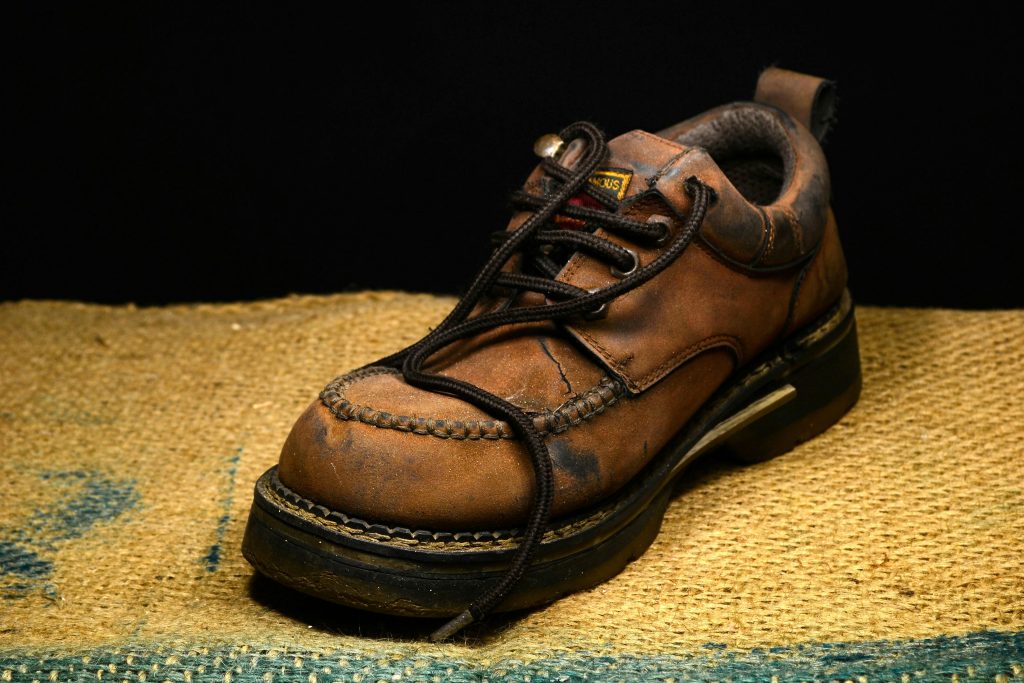 a single brow work boot on a display