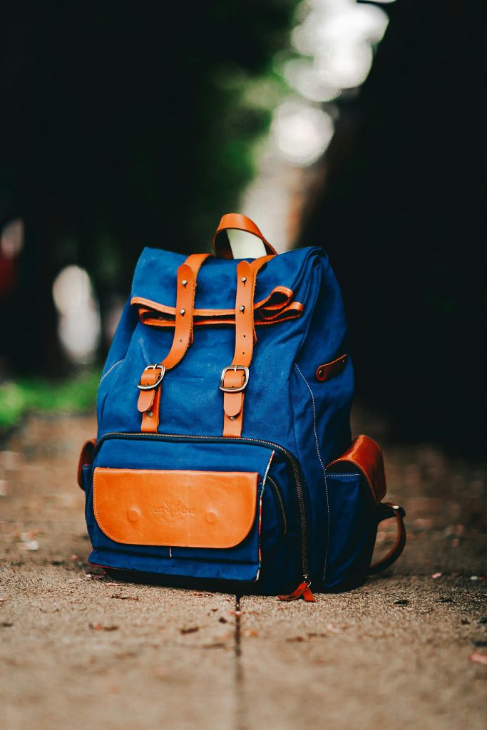 an orange an blue backpack