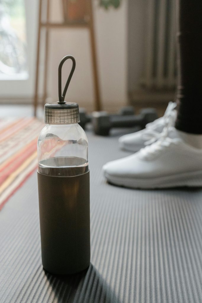 a clear bottle with a lid